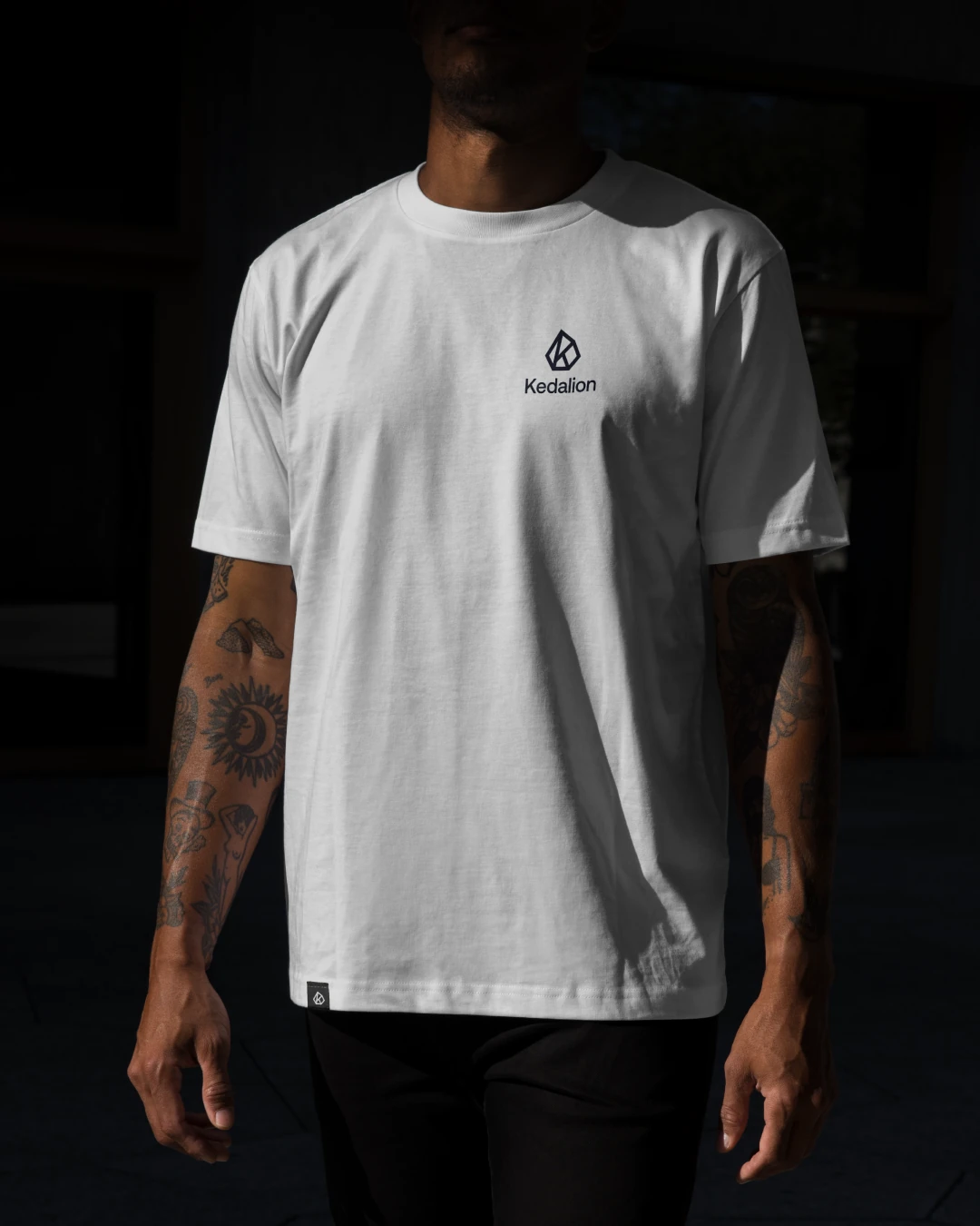 Kedalion logo on a white t-shirt