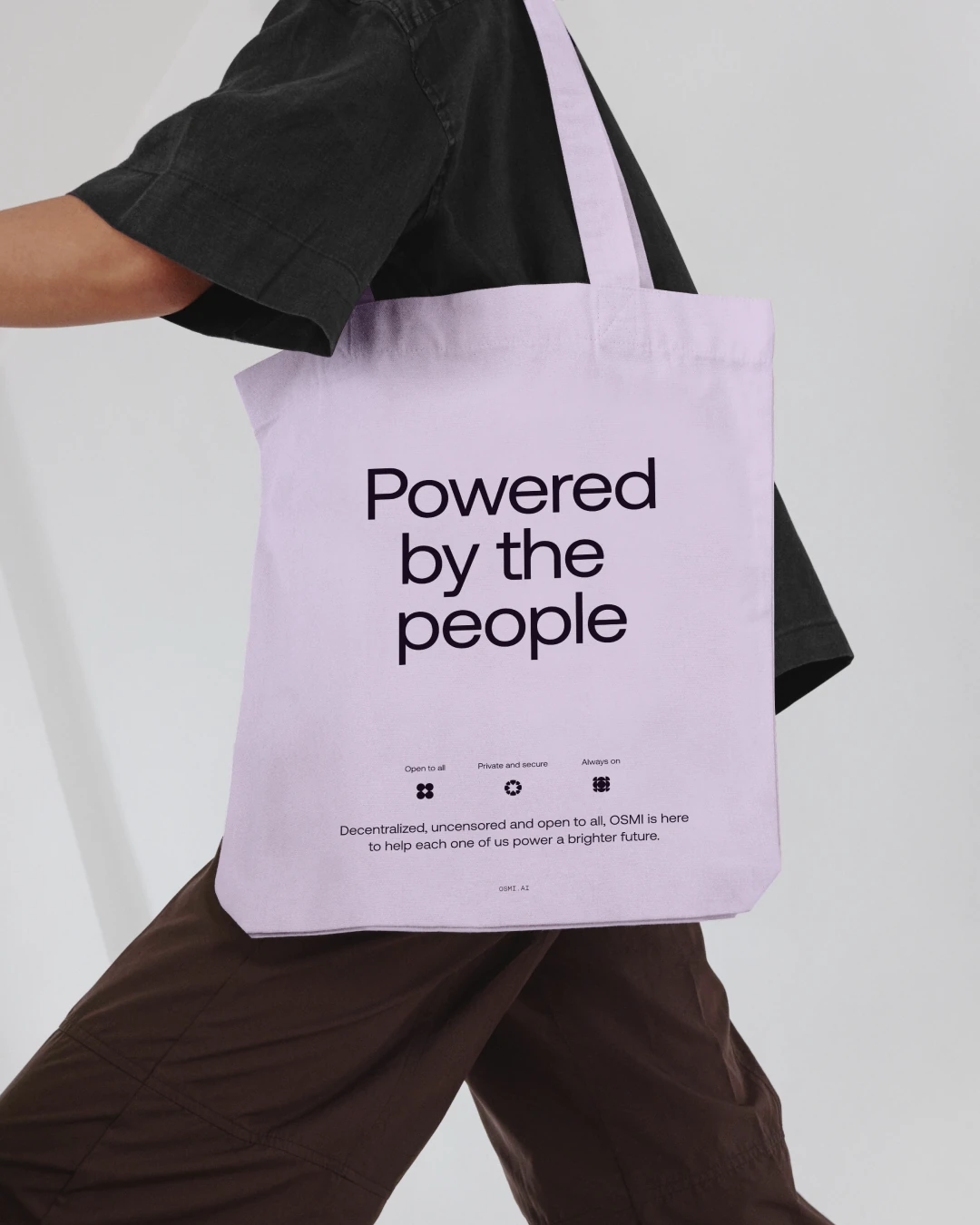 OSMI AI 'Powered by the people' tote bag — brand merchandise for decentralized GPU community